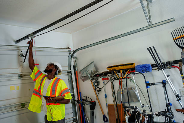 Professional Garage Door Panel Replacement technician working in Lakeview, OR